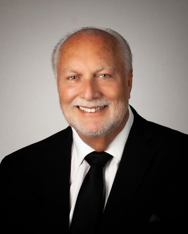 Professional man is white shirt dark tie and dark suit Headshot for company publication. # Headshot, # Headshot Photography,