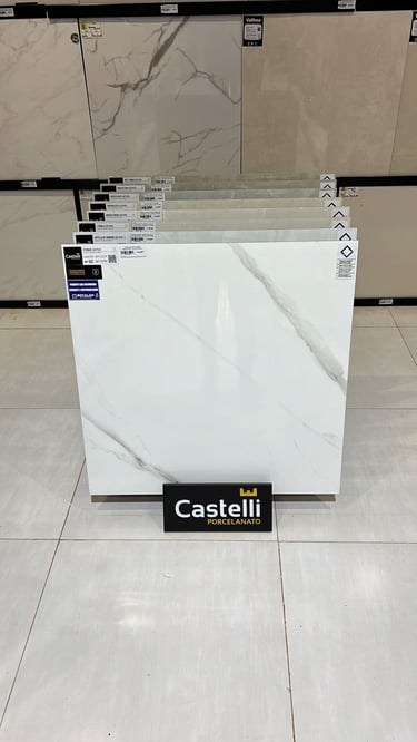 Exposição de pisos e porcelanatos na Bocalan Materiais para Construção, destacando diversas texturas, padrões e acabamentos d