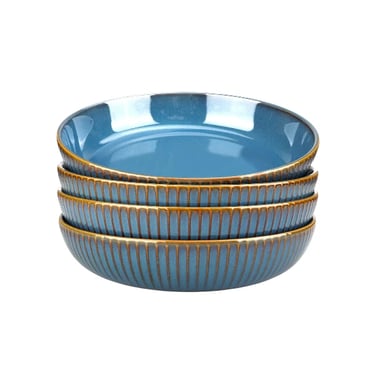  blue ceramic pasta bowls with a ribbed textured exterior and brown rim.