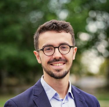 William Coste posing at work