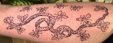 Claude Paradin snake tattoo by Steve Sype