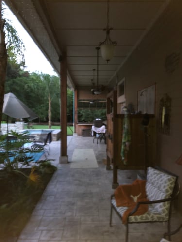 Father's suite and pool house addition. Entrance view.