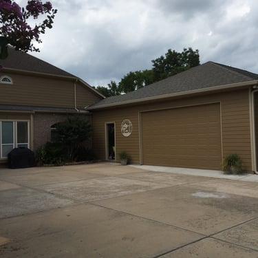 Father's suite and pool house addition.  Garage view.
