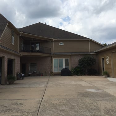 Father's suite and pool house addition.  Garage view.
