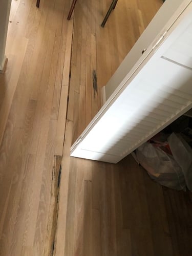 Buckled and damaged floor