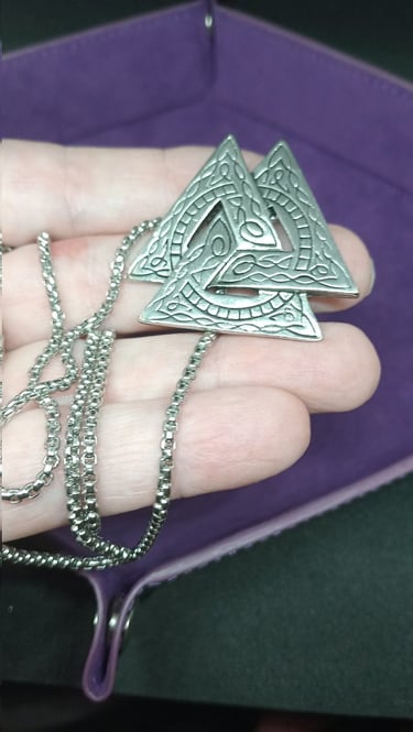 a talisman of Odin's symbol with a necklace