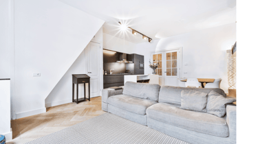 Remodelación de vivienda con ampliación de espacios y decoración minimalista