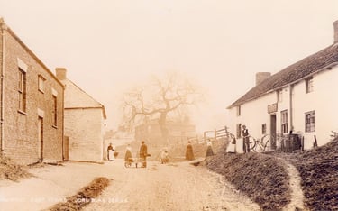 View up Main Street. Christmas Cottage on the right is now single storey