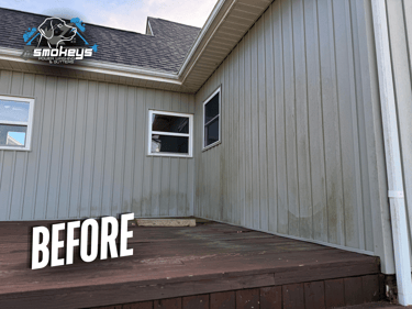 Batten and board vinyl siding before a soft wash