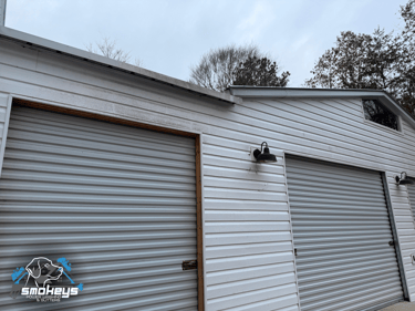 White vinyl siding before a soft wash