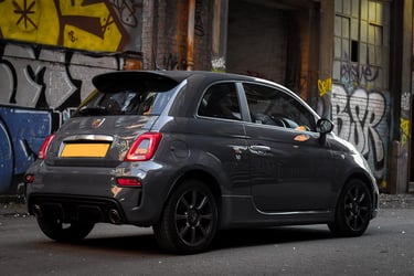 Fiat 595 Abarth in a old derelict warehouse setting