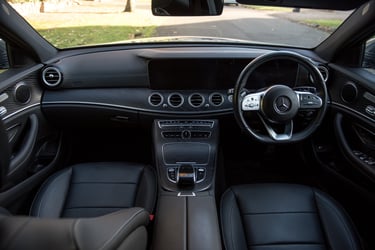 Mercedes driver and passenger pictured from up top