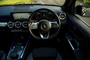 Car interior picture taken from above driver seat