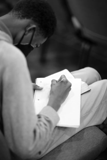 Student taking notes