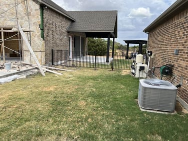 Bricked Shop with Metal Fence