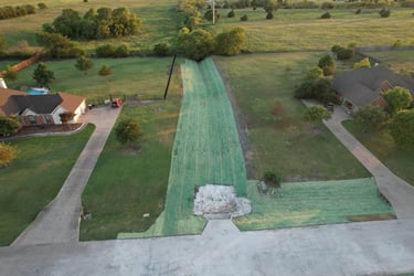 Aerial view of completed drainage channel.