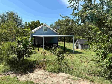 Metal Patio on a Grassy Area
