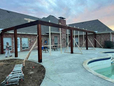 Covered patio frame under construction.