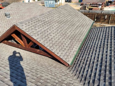 Shingle Roof under Cedar Patio.
