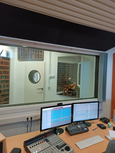 Wes Fillmore recording guitar tracks for a band