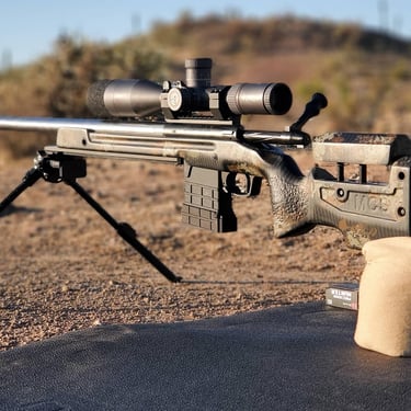 Precision rifle With MDT bipod and the magazine and Manners PRS TCS Zermat arms TL3 action