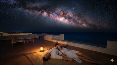 A couple lies on a rooftop terrace stargazing in Marsa Alam.