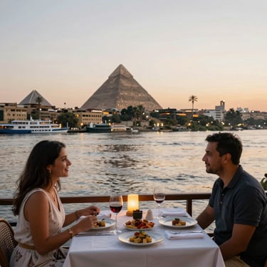 A couple enjoys a romantic dinner on a Nile River cruise with the Pyramids of Giza in the background.