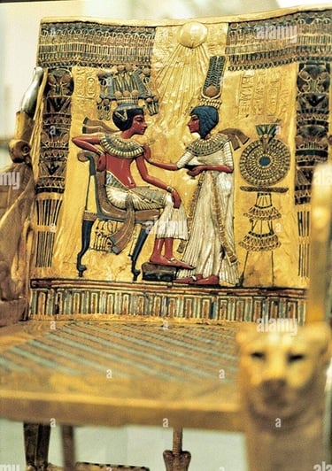 Golden throne of Tutankhamun featuring detailed Egyptian art of the King and Queen Ankhesenamun.