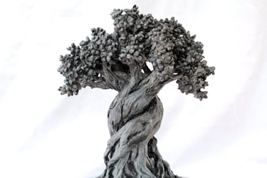 Graine 26, sculpture en marbre noir golzine par le sculpteur Herrel
