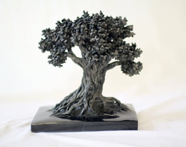 Graine 35, sculpture en marbre noir golzine par le sculpteur Herrel
