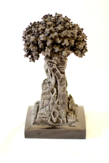 Graine 36, sculpture en marbre noir golzine par le sculpteur Herrel
