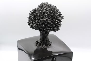 Graine 10, sculpture en marbre noir golzine par le sculpteur Herrel