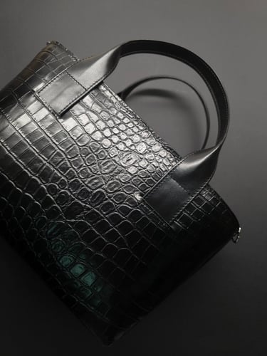 Black elegant crocodile print leather handbag with top handles