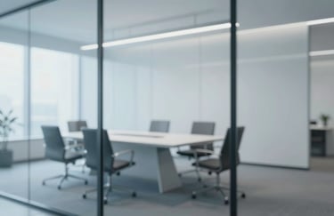 An interior shot of a minimalist, high-end corporate board room with glass walls, reflecting a clean and professional agency environment. Uses the palette #F5F8FA and #CCD6E0.