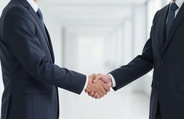 Two professionals in dark suits shaking hands in a high-contrast, minimalist hallway. The lighting highlights their confidence, with colors #E0E1DD and #0D1B2A predominating.