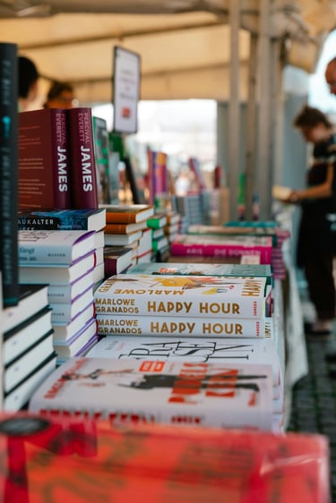 piles of books in a bookshop
