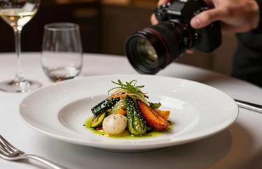 Behind-the-scenes photography in a high-end North American restaurant. A professional photographer is capturing a beautifully plated dish of seasonal vegetables. Soft, warm ambient lighting.