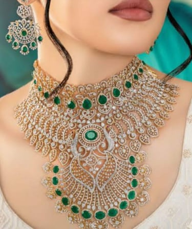 A woman wearing a luxury diamond and emerald bridal necklace with matching chandelier earrings.
