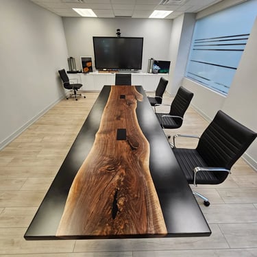 Custom black walnut epoxy boardroom table — top surface and grain detail