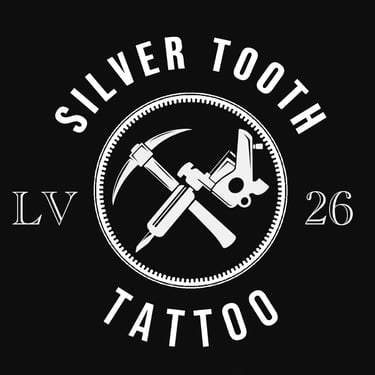 Silver Tooth Tattoo logo