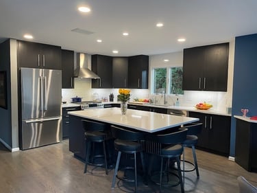 Custom designed and made kitchen cabinetry and kitchen island.
