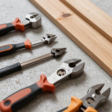 Close-up of professional carpentry tools on a light grey stone surface next to high-quality timber planks, representing technical reliability.