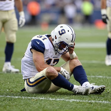 Minimalist dark-toned image of a calm brain scan overlay on a black background.