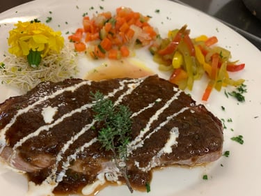 Cebra con salsa al tomillo