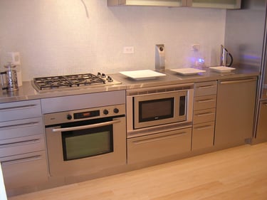 Stainless steel cabinets and appliances for modern living.