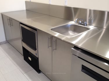 Stainless steel cabinets, countertop and back splash