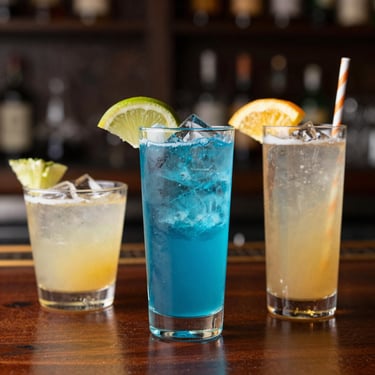 Cozy sports bar area with large screens showing live sports and customers enjoying drinks.