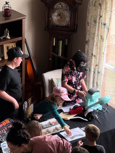 kids making hats at hat station