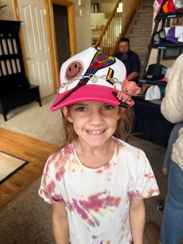 girl with finished hat and monkey brimpet