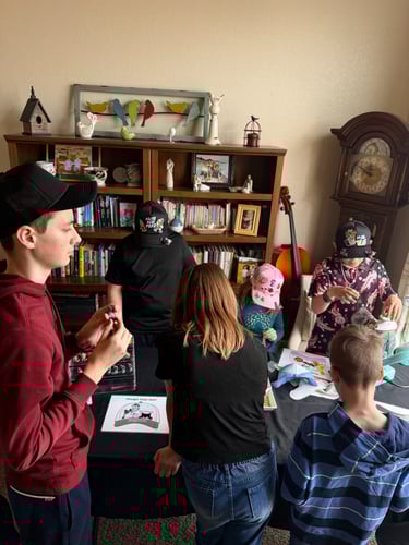 kids making hats at hat station